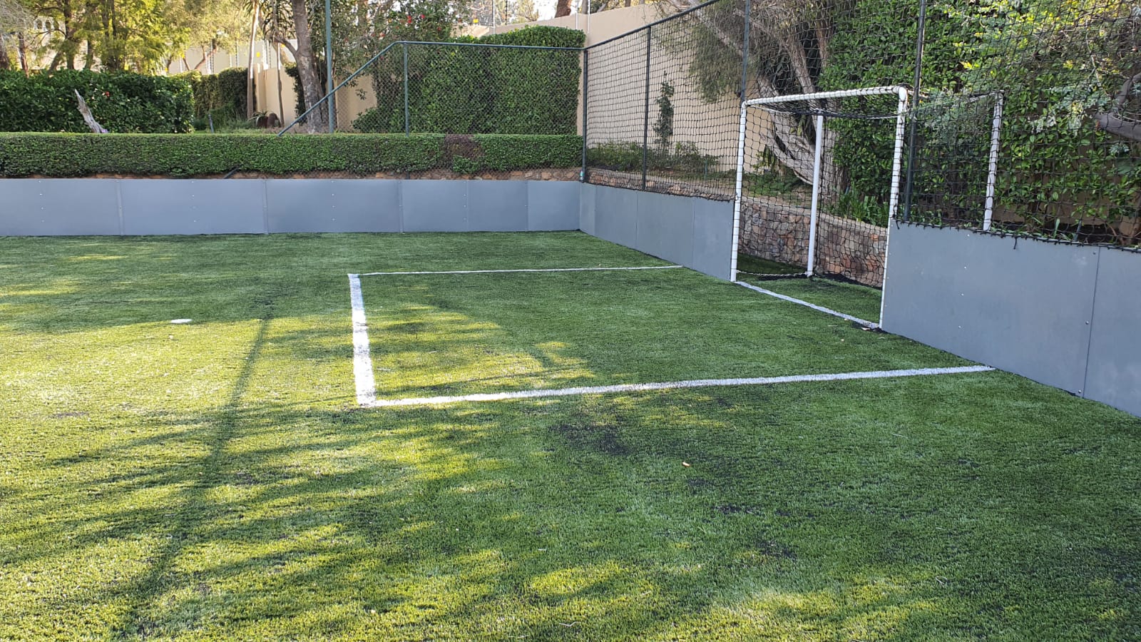 soccer pitch with kickboard system