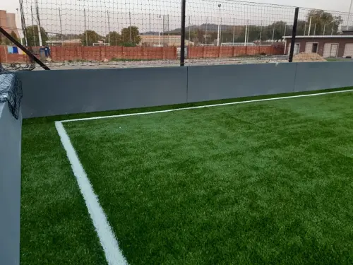 soccer ptich with kick wall